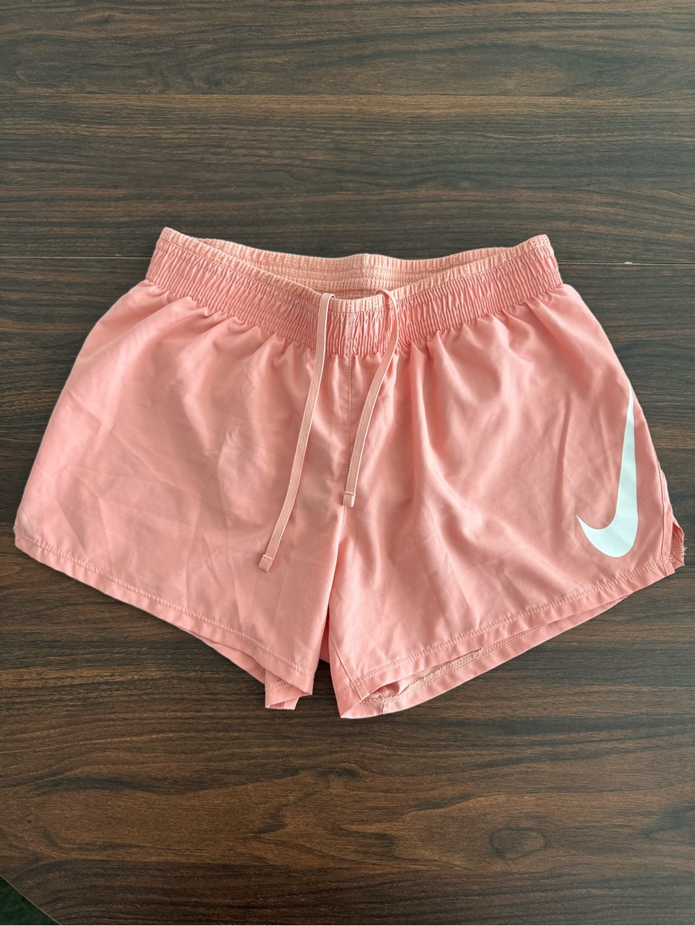 Nike Women’s Coral Athletic Running Shorts with White Swoosh